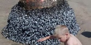 Dad Shares Innocent Photo Of His Son At Beach, Authorities Act Fast After Spotting Small Detail